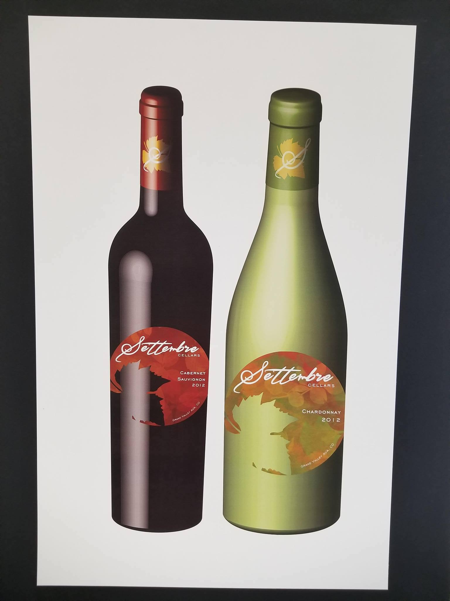 2 bottles of wine with custom made wine labels. Round with a cutout of a maple leaf on the bottom
